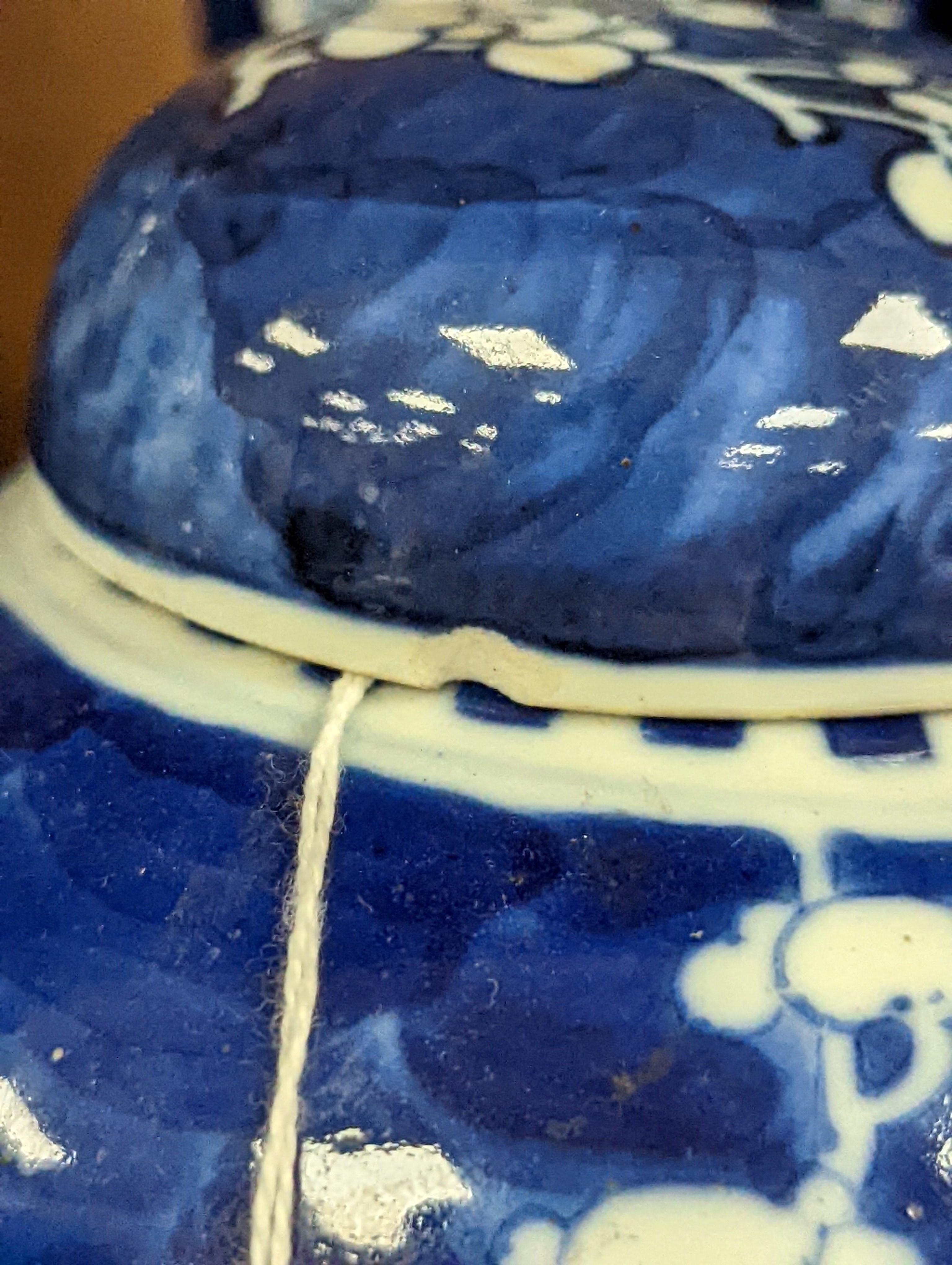 A pair of Chinese blue and white vases and eleven jars, six with covers., Vase and matching cover 28 cms high.